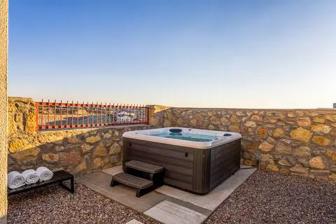 6c9a7e32 7980 4638 bb36 58085897f83ahot tub 1 enchanted bluff.jpeg.jpg